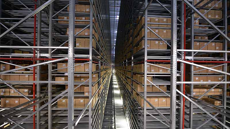 Metal rackings with cardboard boxes at the Mango distribution center