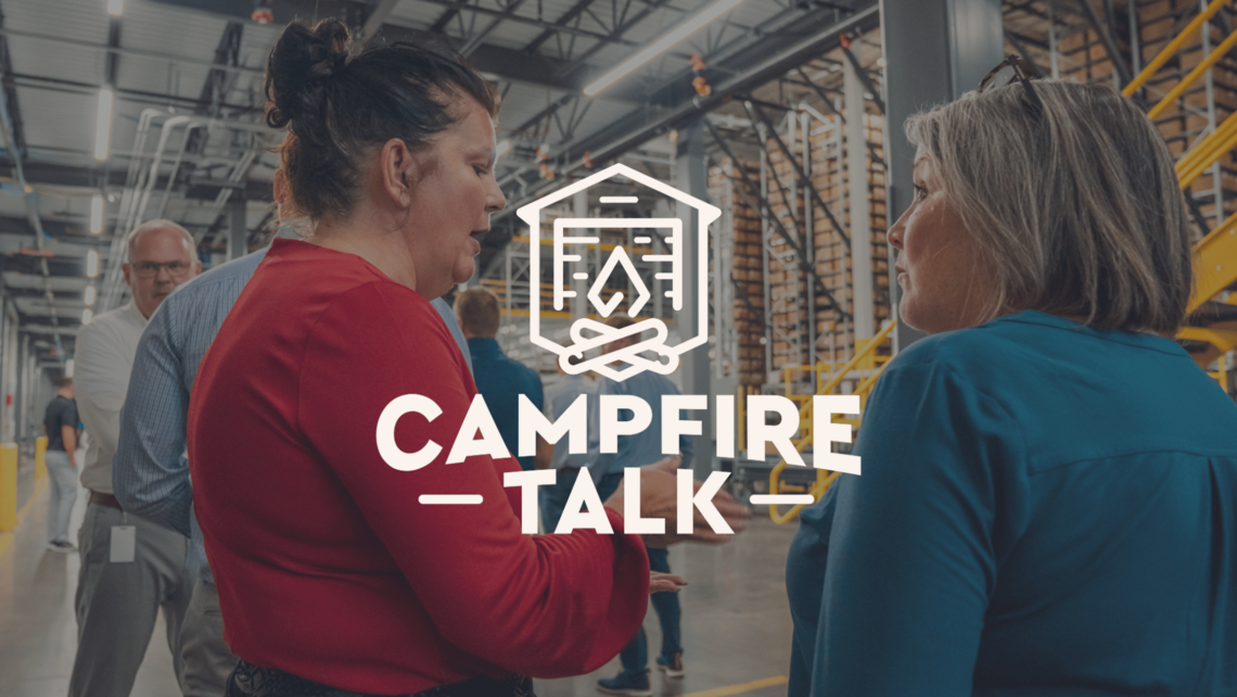 Attendees of the Campfire Talk at Gap's facility talking to each other with the Campfire Talk logo overlaid