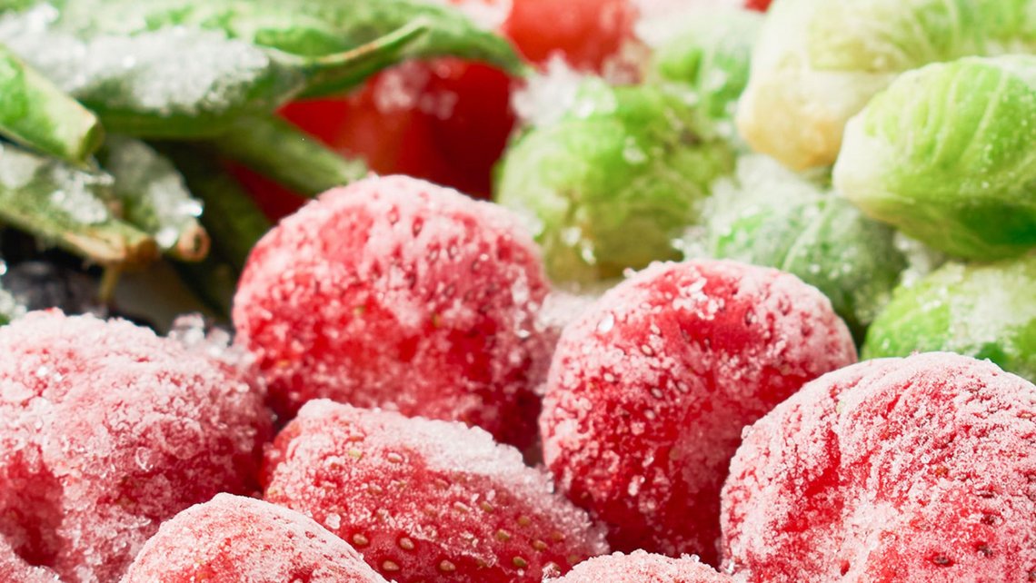 Mix of frozen products with raspberries