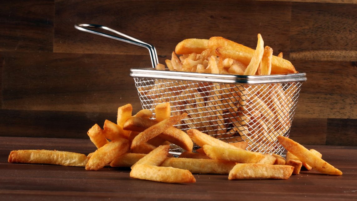 Basket of golden fried French fries