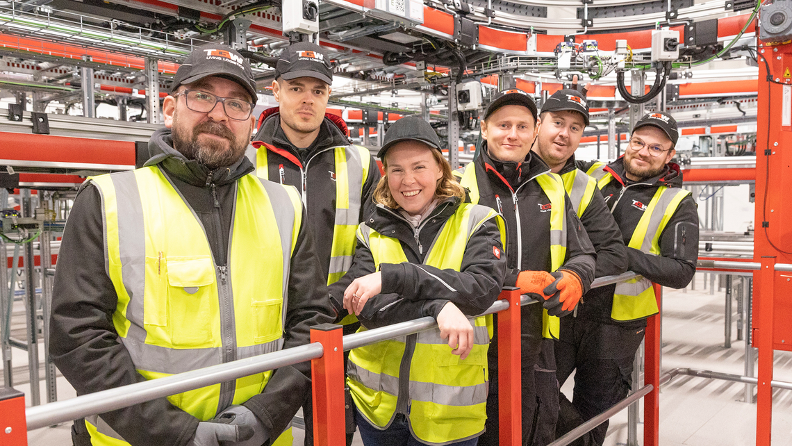 TGW Logistics on-site LTS team at a highly automated grocery logistics center, keeping the facility running smoothly